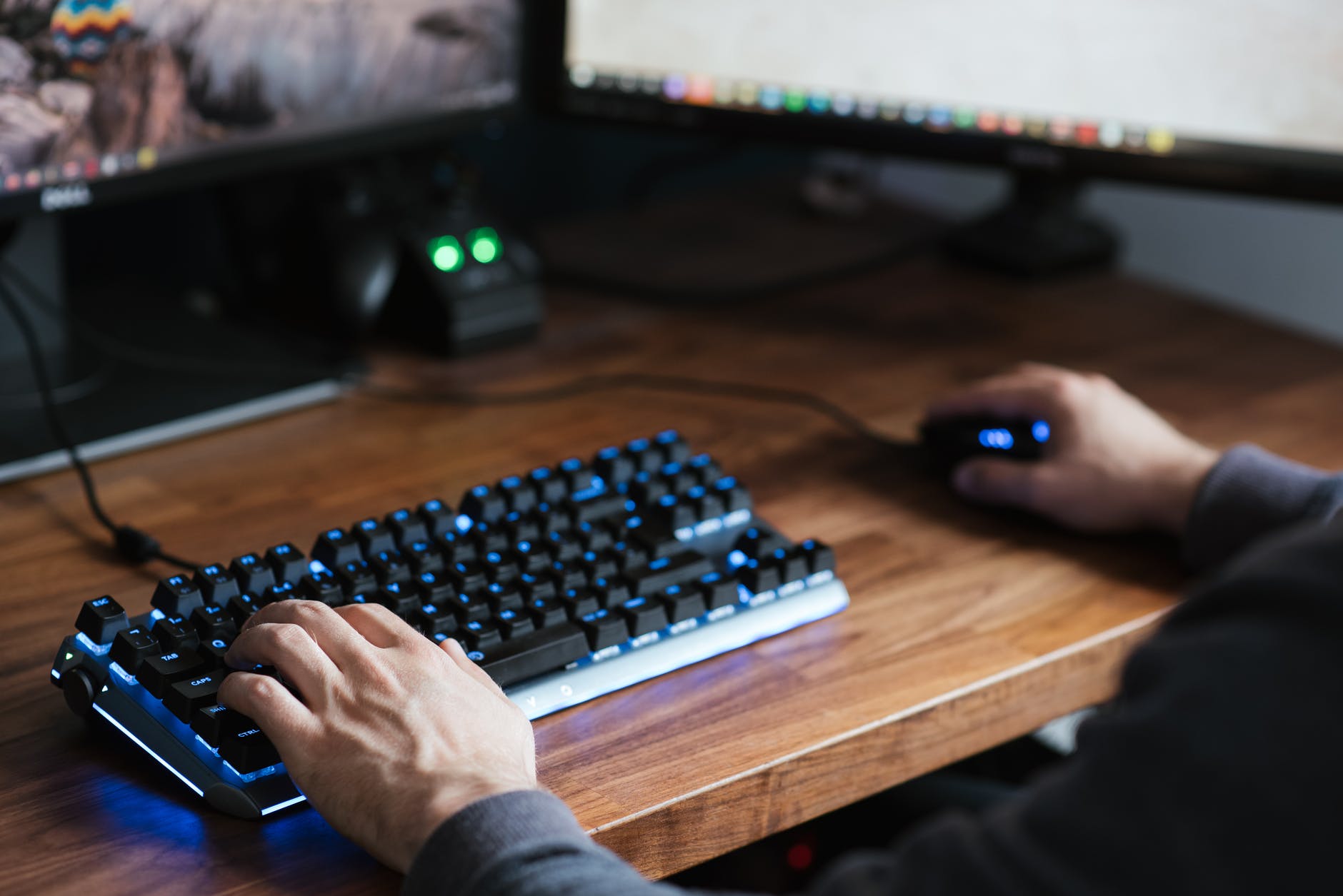 crop unrecognizable man working on modern computer